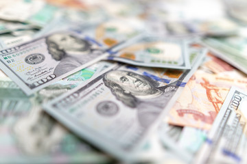 Dollars and Russian rubles on the table as background
