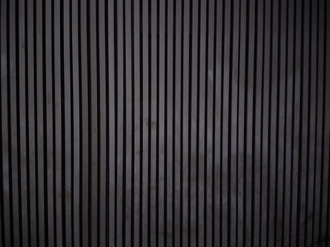 Black wood plank wall texture background. Vertical wooden. Loft style 