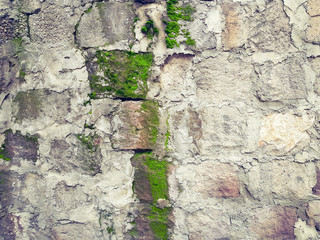 mossy wall made of armenian tuff texture background 