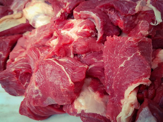 Raw deer beef cut pieces background