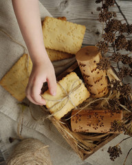 Cut out cookies with snowflakes print. Children's handle stretches to the cookies