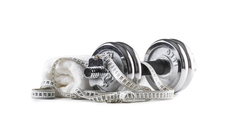 Naklejka premium Dumbbells towel and measure tape isolated on white background
