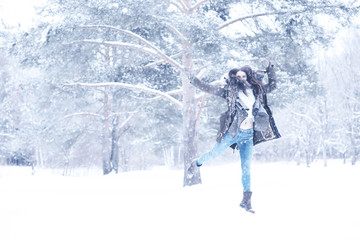 Beautiful girl in a beautiful winter snow