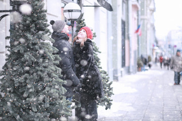 Young couple walking through the winter