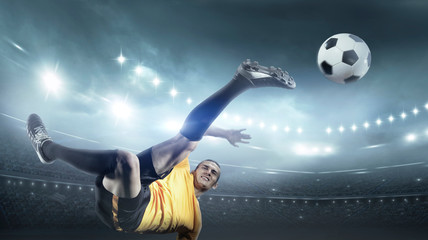 Soccer player in action on stadium background.