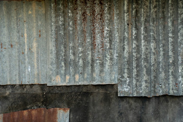 Old walls made of zinc and rubber sheets for background of vintage house.