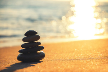 Stones balance on the beach. Zen meditation.