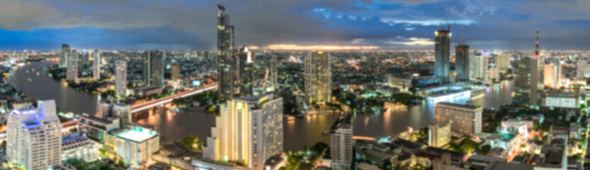 Fototapeta na wymiar Bangkok city - Beautiful sunset curve Chao Phraya River panoramic Cityscape urban of Bangkok city at night , panorama landscape Thailand
