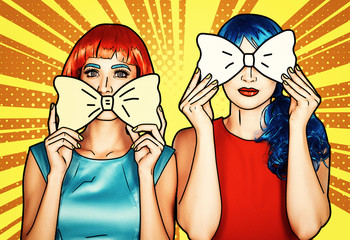 Females in red and blue wigs. Girls with yellow bow-tie in hands