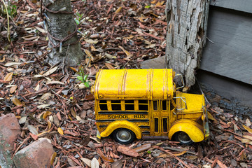 Fototapeta na wymiar yellow truck toy on the road