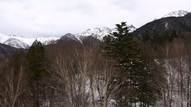 POV Shot : Cable cabin over snow mountain , Shinhotaka Ropeway, Cable car station, Takayama Gifu, Japan