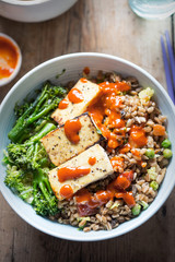 Spelt, broccoli, savoy cabbage with chargrilled tofu with sriracha 
