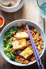 Spelt, broccoli, savoy cabbage with chargrilled tofu with sriracha 