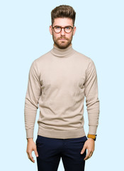 Fototapeta premium Young handsome business man wearing glasses skeptic and nervous, frowning upset because of problem. Negative person.