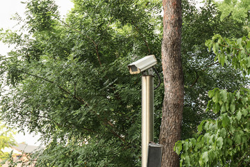 CCTV camera on a pole in the park