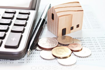 Business, finance, savings, money management, property loan or mortgage concept : Wood house model,...