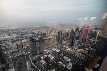 The top view on Dubai from the highest tower in the world, Burj Khalifa, UAE
