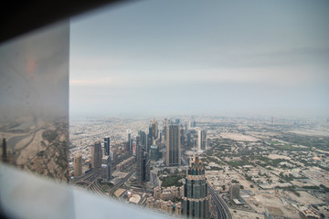 Fototapeta na wymiar Top view of Dubai city downtown and dubai marina urban skyline from Burj Khalifa.