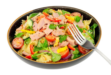 Ham and pasta salad meal isolated on a white background