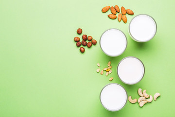 Nuts non diary milk in glasses . Health care, diet and nutrition concept