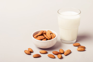 Almond non diary milk and nuts. Health care and diet concept
