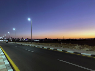 incredibly beautiful roads and coastline with palm trees near the red sea in the tourist resort of the sunny town of Sharm El Sheikh in Egypt