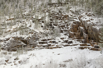 Winter landscape of granite peaks covered with snow