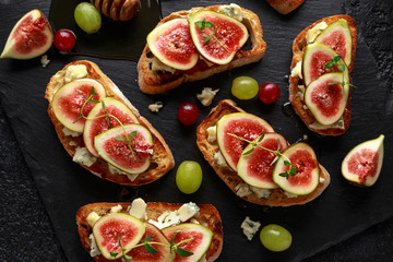 This Fig and Gorgonzola tartines, toast, bruschetta. drizzled with honey.