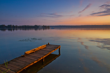 Fototapeta na wymiar Orange - a blue lake landscape.