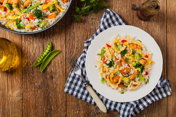 Nasi goreng. Fried rice with egg and vegetables.