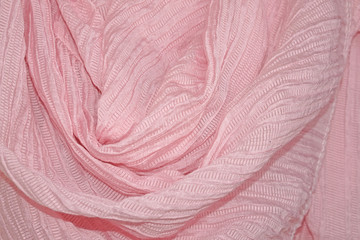 Fototapeta na wymiar sweet pink color cotton cloth folding background 