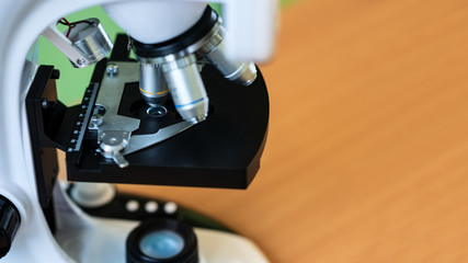 Modern digital microscope with LCD display.