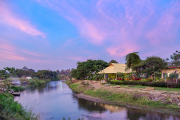 Scenic view of the Pai river and the village at sunset, Thailand