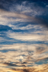 Cloudscape background of dramatic cirrus and cumulus clouds