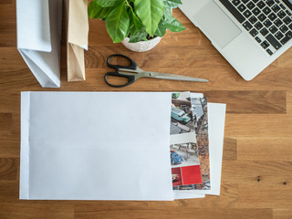 White envelopes on a work desk.