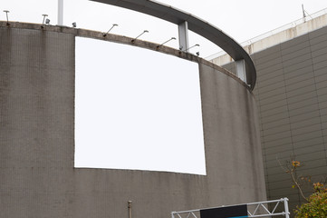 Large blank billboard on a street wall, banners with room to add your own text