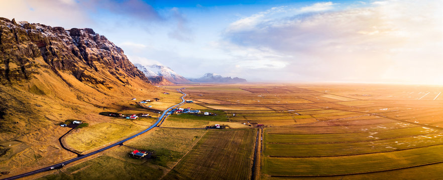 Village And Scenic Road In Iceland Aerial Panoramic View