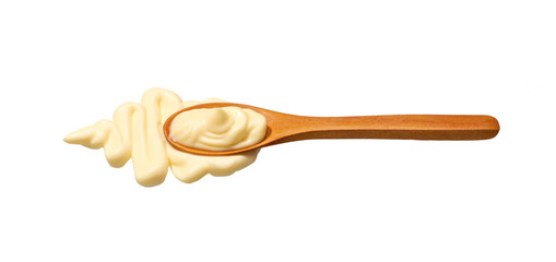 Mayonnaise sauce in small wooden spoon isolated on white background,