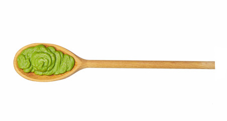 Wasabi sauce in wooden  spoon isolated on white background,Top view