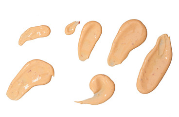 Fototapeta premium Brush strokes paprika sauce isolated on white background.Top view.