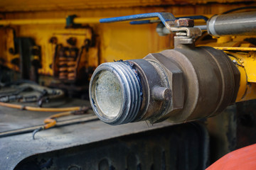 Old Yellow High Pressure Valve in Water truck