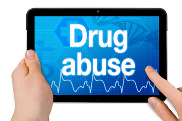 Tablet computer isolated on white background with drug abuse