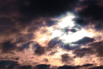 blurred soft focus. Sunset or sunrise with clouds, light and other atmospheric effects.