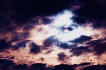 blurred soft focus. Sunset or sunrise with clouds, light and other atmospheric effects.