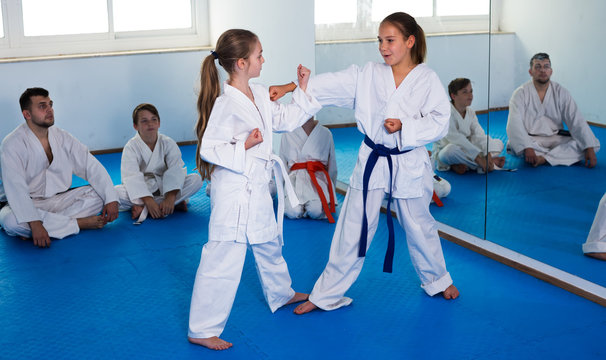 Girls training during karate class
