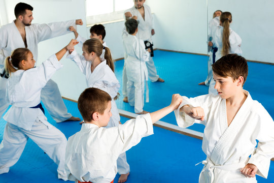 Children training in pairs