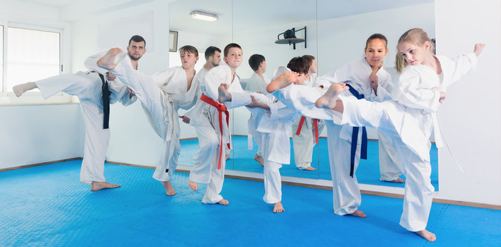 Children practicing new moves during karate class