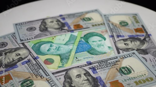 Iranian Rial And Dollars On Rotating Table Portrait Of Khomeini Iranian Rial And Dollars On Rotating Table Portrait Of Khomeini Money 4k Stock Footage Royalty Free Videos Fotolia Vid 241996884