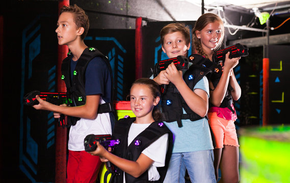 Teen kids with laser guns