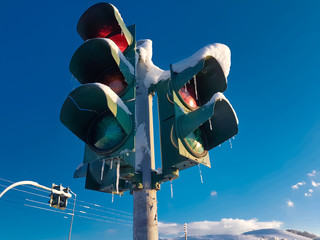 traffic lights snow icered  blue sky